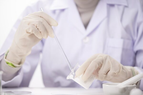 Healthcare creme production in laboratory. Creme products in lab. Healthcare industry.